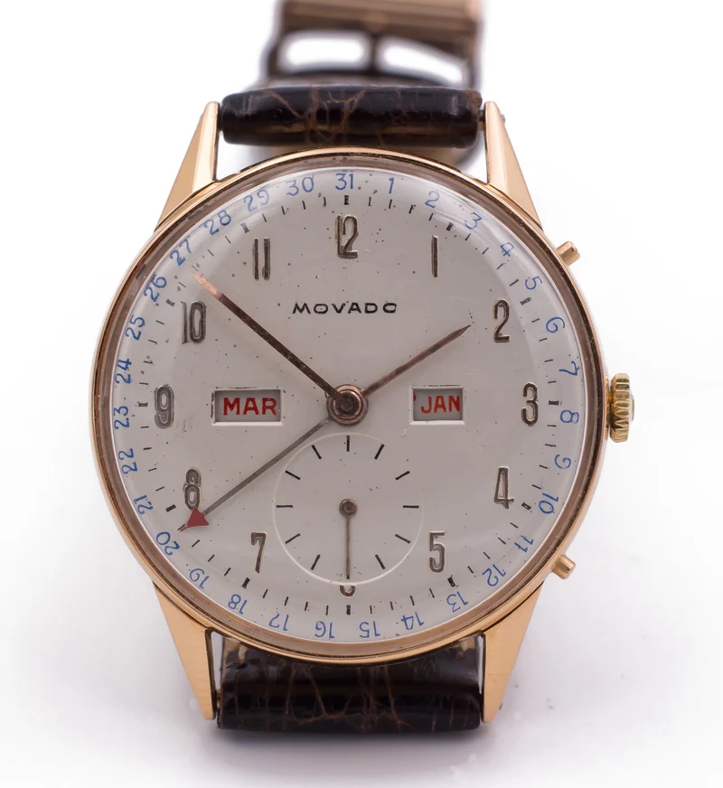 Montre-bracelet Movado vintage en or avec calendrier complet, 1950