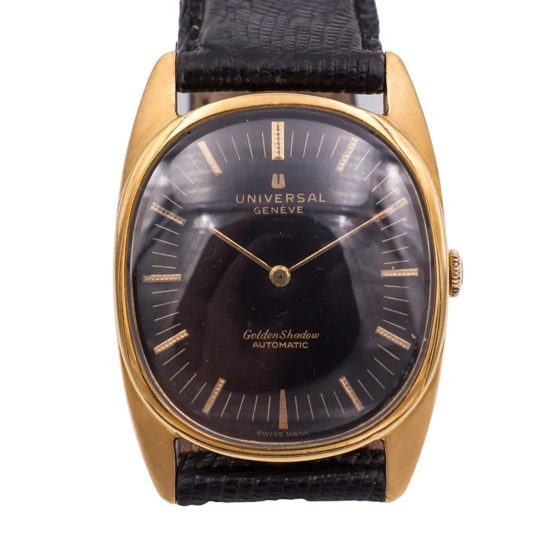 Montre vintage automatique Universal Geneve "GoldenShadow" en or 18 carats. Années 50