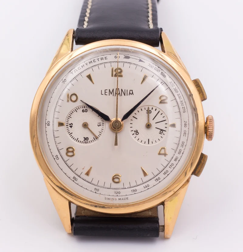 Chronographe vintage Lemania en or 18 carats, 1950.