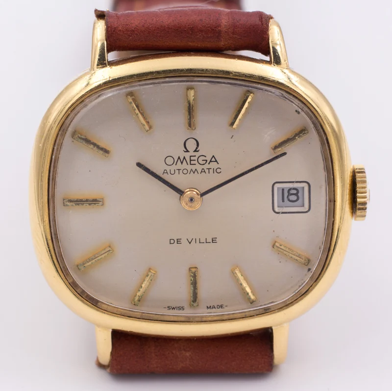 Montre-bracelet automatique vintage Omega De Ville en or 18 carats avec date, vers 60