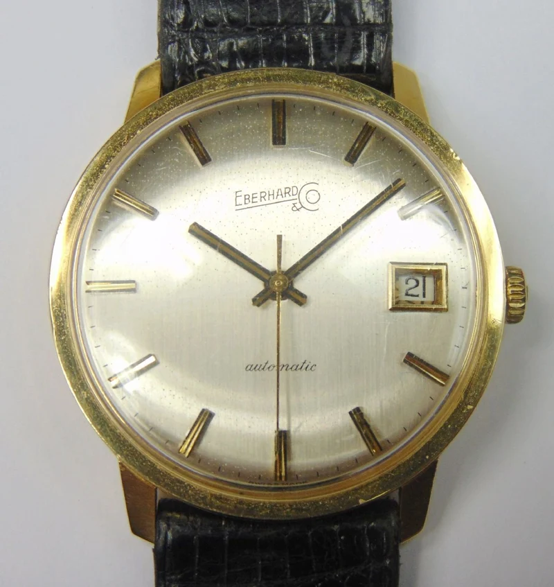 Montre-bracelet automatique vintage en or Eberhard avec date. Année 1975. Avec boite et garantie